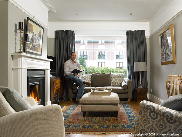 Andrew Webb in the sitting room of his semi detached home in the Belmont area of Belfast.
